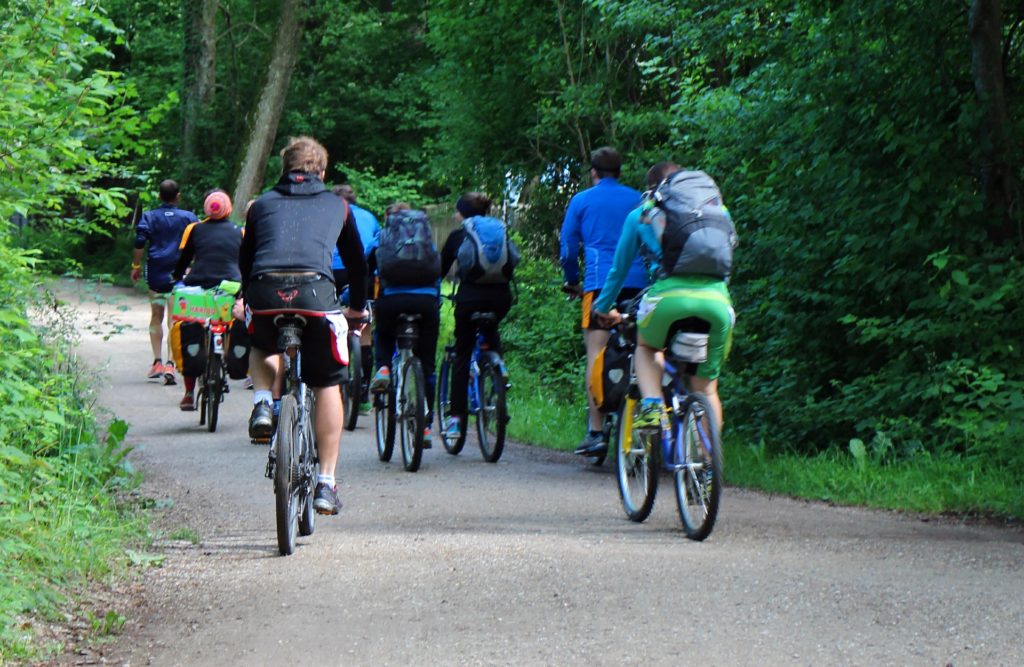 team building Serbia riding a bicycle